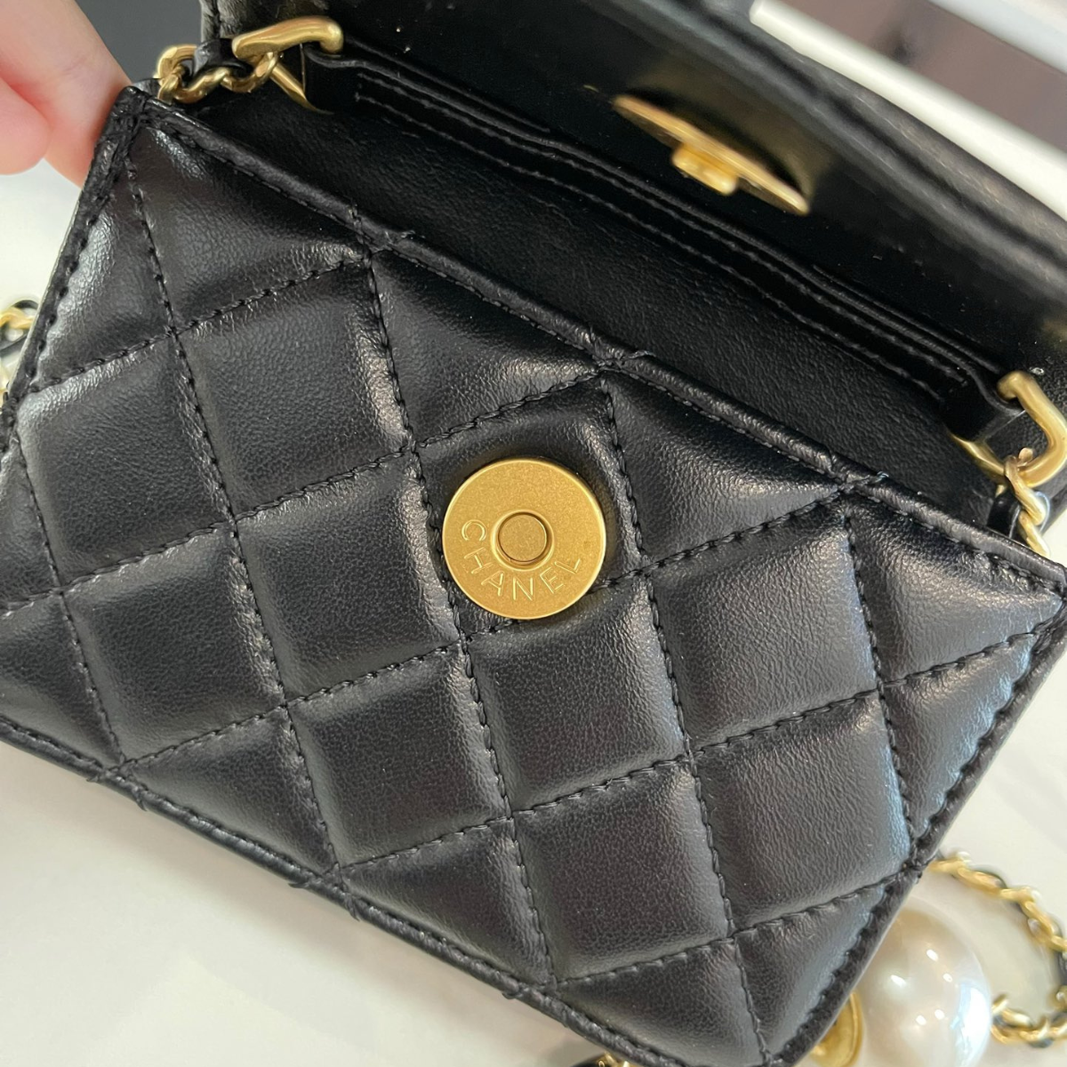 Chanel Pearl Dumpling Bag