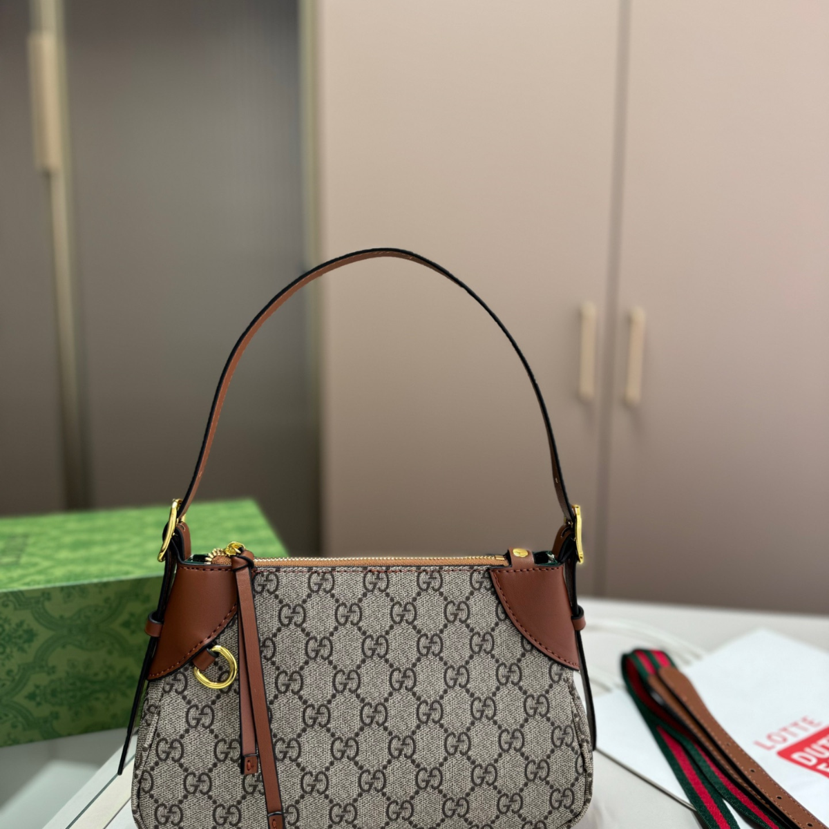 Gucci Emblem Croissant Bag