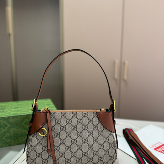 Gucci Emblem Croissant Bag