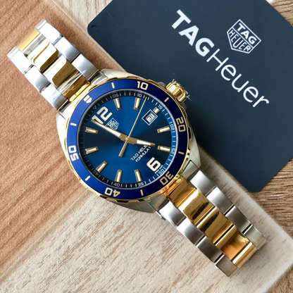 TAG Heuer Automatic Watch with Blue Dial and Gold Bracelet