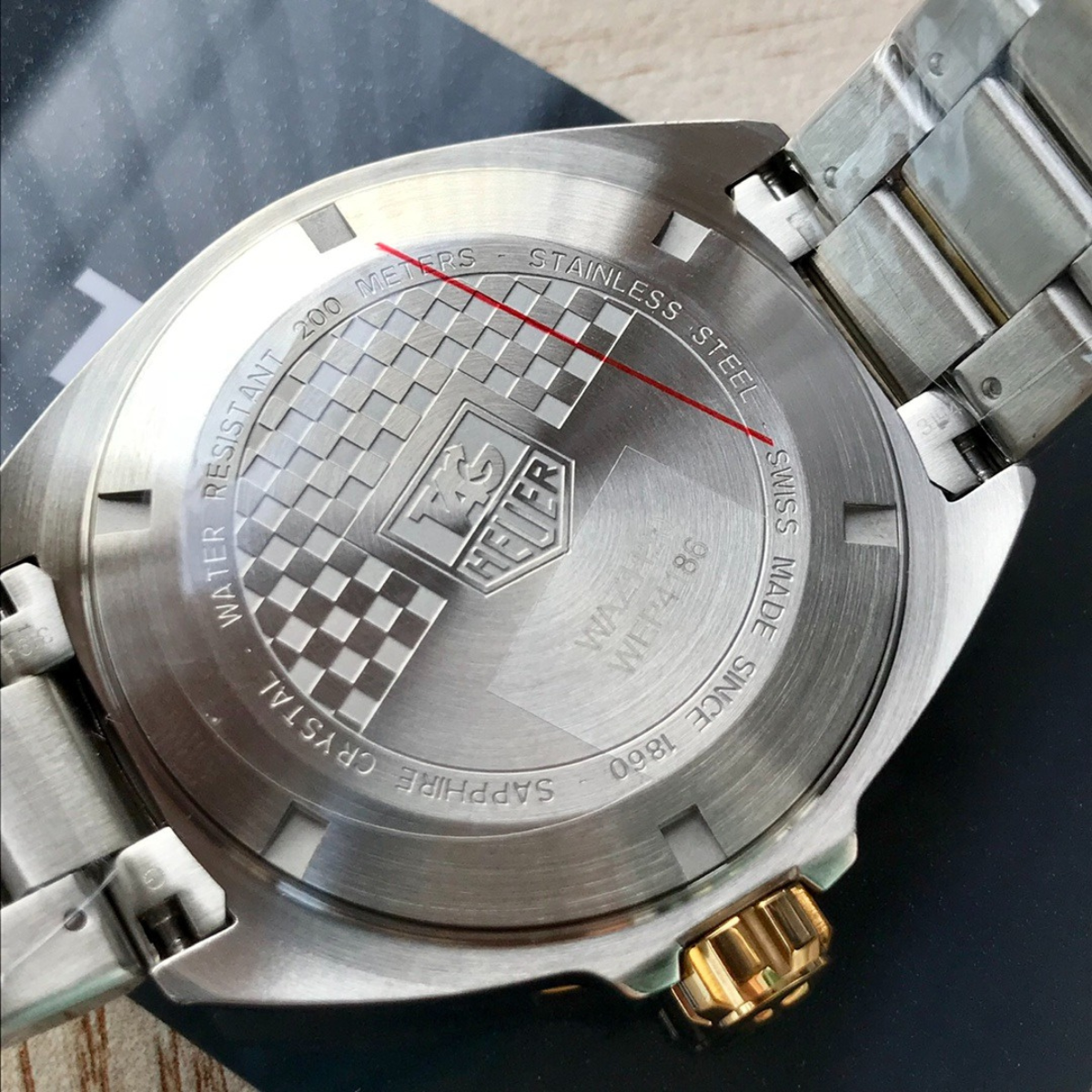 TAG Heuer Automatic Watch with Blue Dial and Gold Bracelet