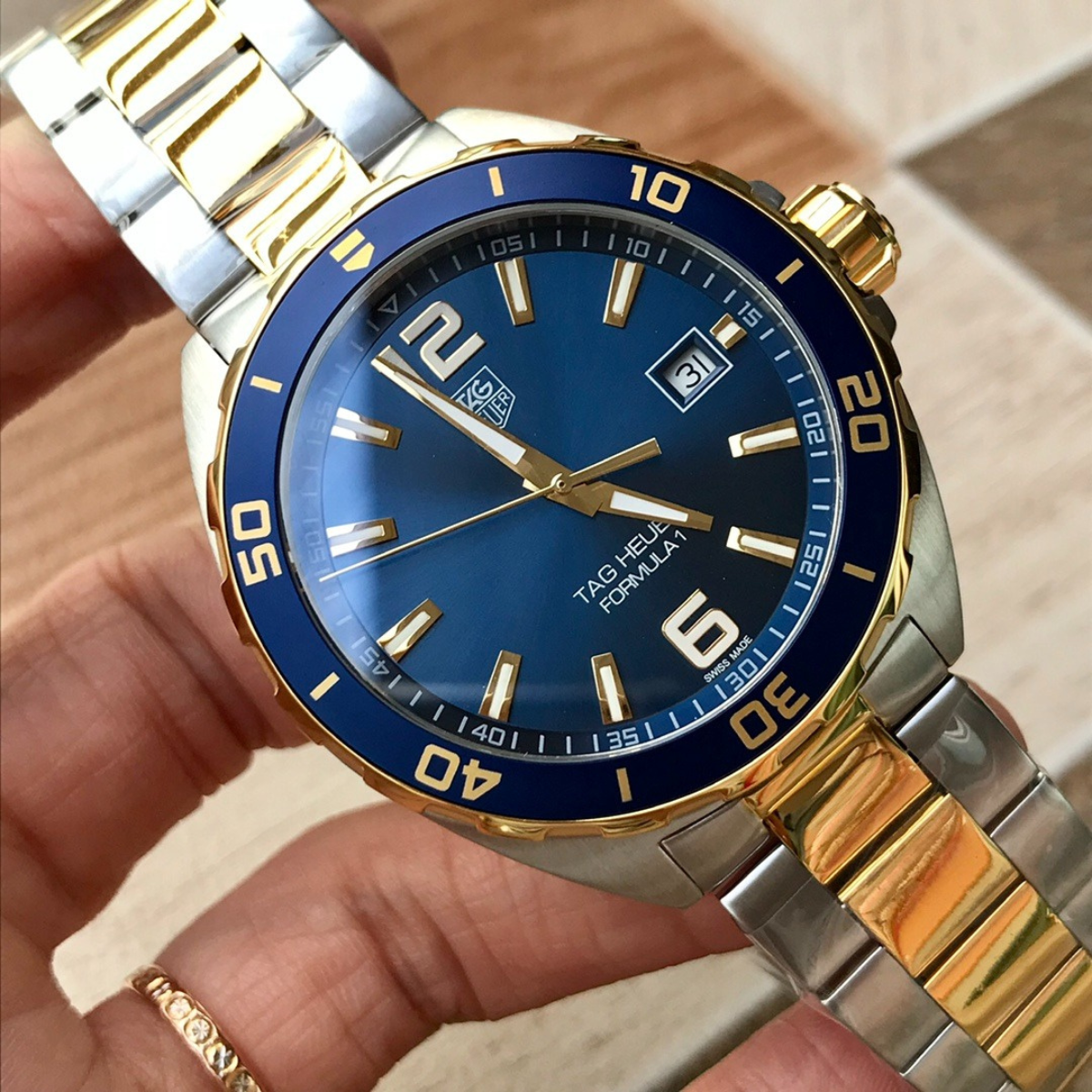 TAG Heuer Automatic Watch with Blue Dial and Gold Bracelet