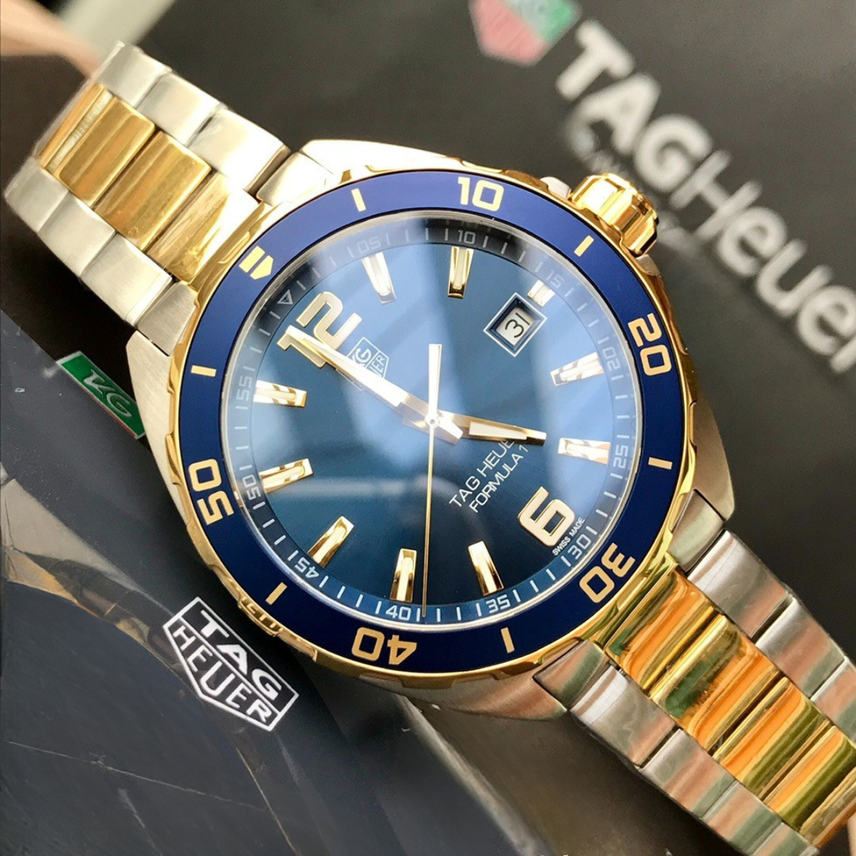 TAG Heuer Automatic Watch with Blue Dial and Gold Bracelet