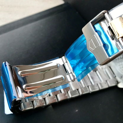 TAG Heuer Automatic Watch with Blue Dial and Gold Bracelet